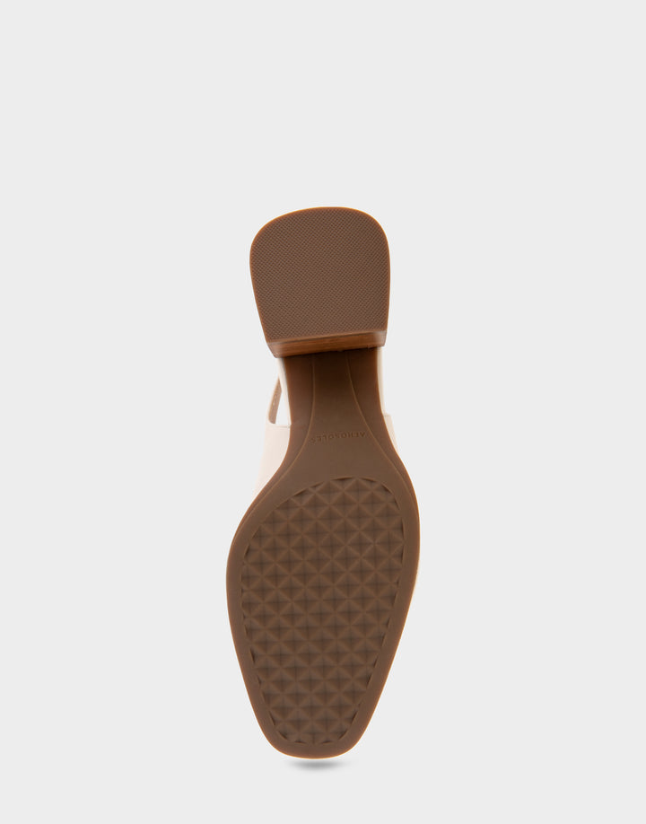 Comfortable Women's Ornamented Block Heel Slingback in Eggnog Leather Bottom View