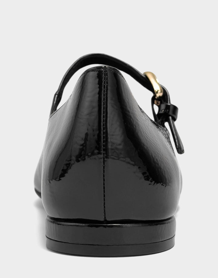 Comfortable Women's Flat In Black Patent Faux Leather Back View