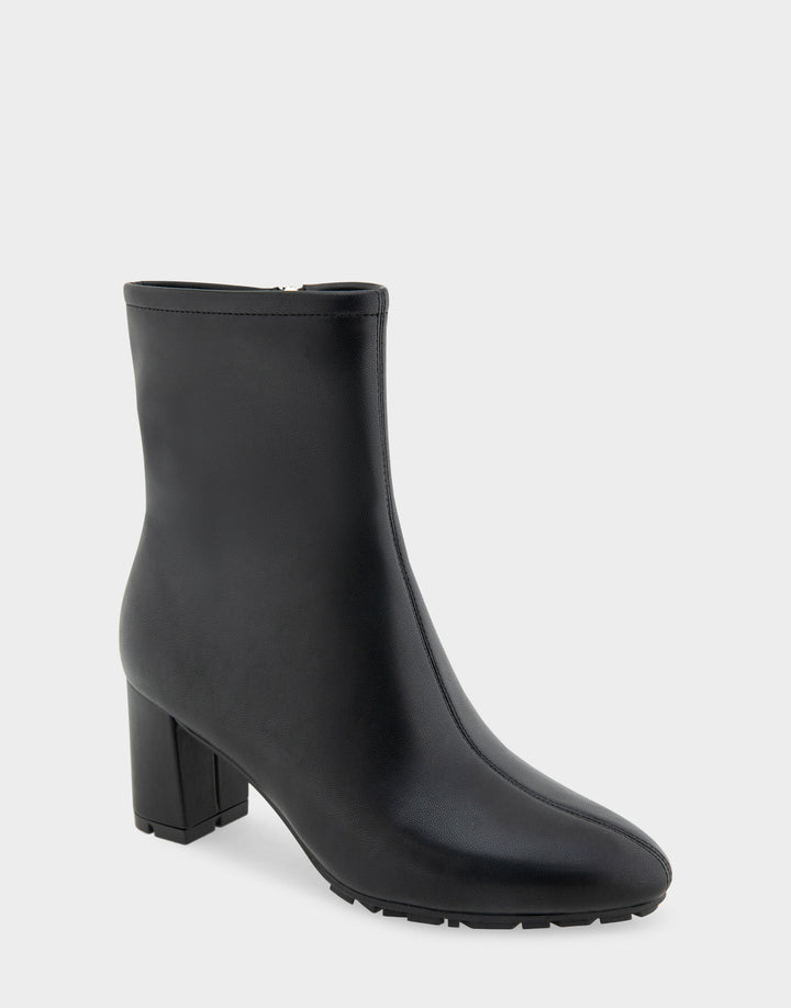 Comfortable Women's Mid Block Heel Bootie In Black Faux Leather Side Angle View