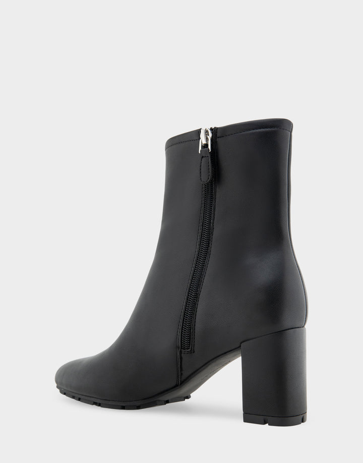 Comfortable Women's Mid Block Heel Bootie In Black Faux Leather Opposite Side View With Zipper