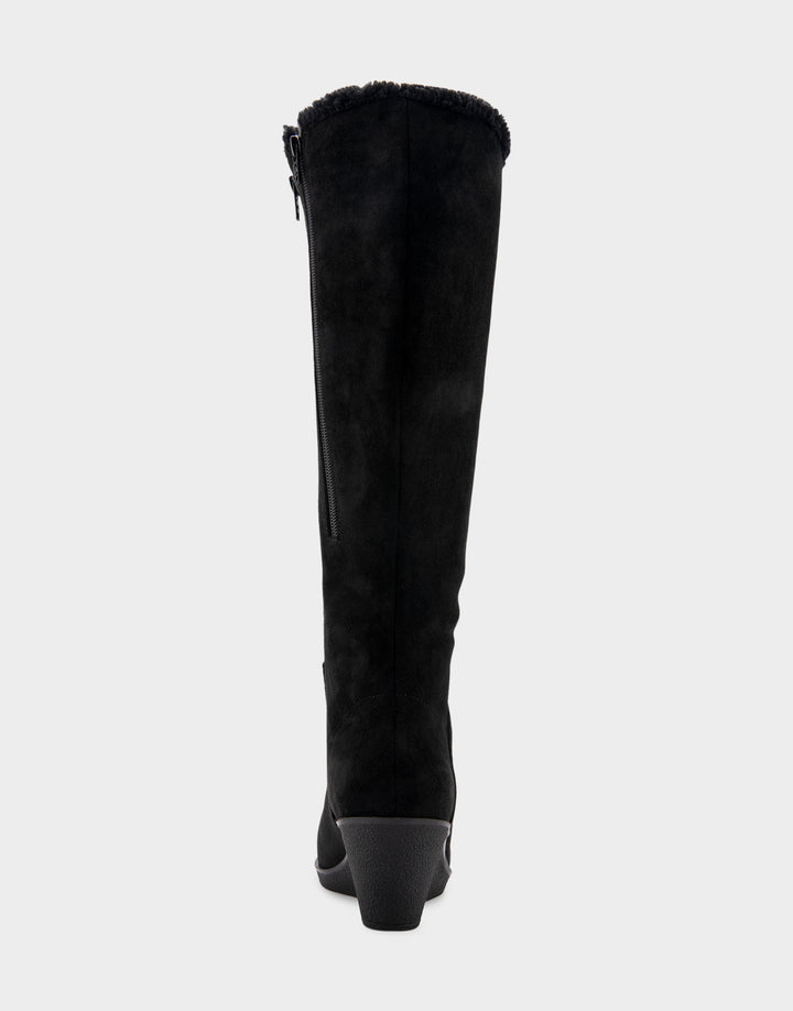 Comfortable Women's Faux Shearling Trimmed Knee High Wedge Boot in Black Faux Suede Back View