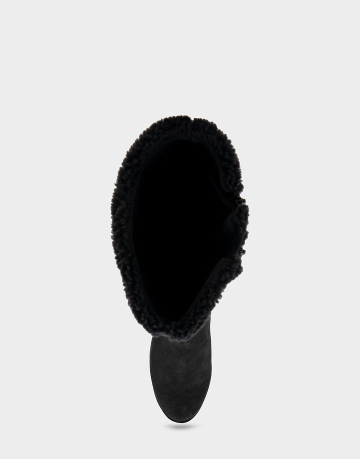 Comfortable Women's Faux Shearling Trimmed Knee High Wedge Boot in Black Faux Suede Full Front View