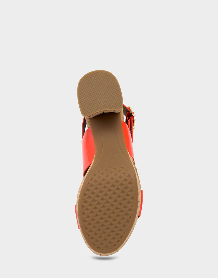 Comfortable Women's Platform Sandal in Orange Faux Patent Bottom View