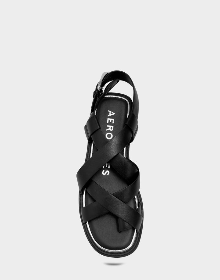Comfortable Women's Flat Sandal in Black Faux Leather Full Front View
