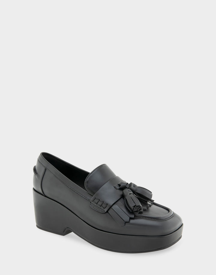 Comfortable Women's Flatform Loafer In Black Faux Leather Angle View 
