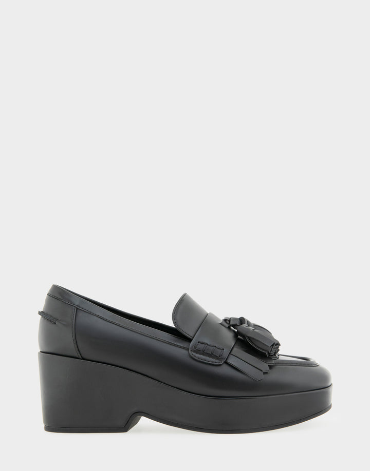 Comfortable Women's Flatform Loafer In Black Faux Leather Side View 