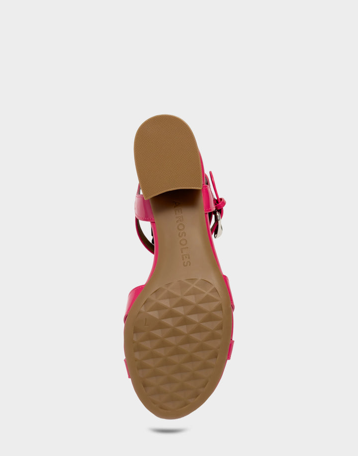 Comfortable Women's Low Heeled Sandal in Pink Faux Patent Bottom View