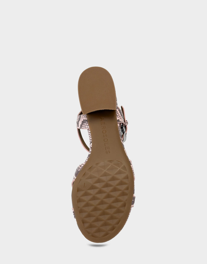 Comfortable Women's Heeled Sandal in Pink Faux Snake Print Leather Bottom View