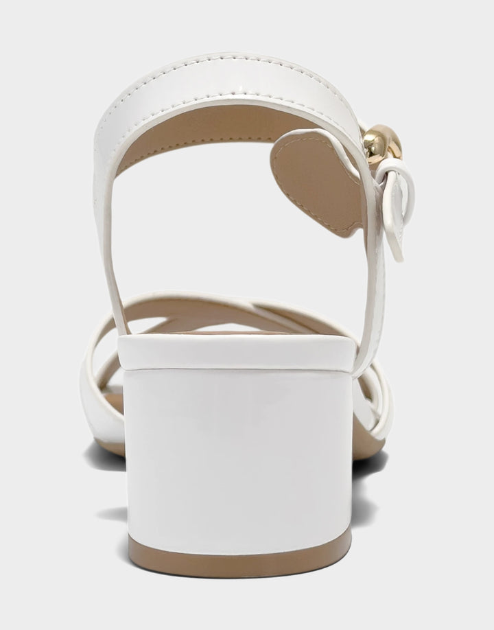 Comfortable Women's Low Heeled Sandal in White Faux Patent Back View