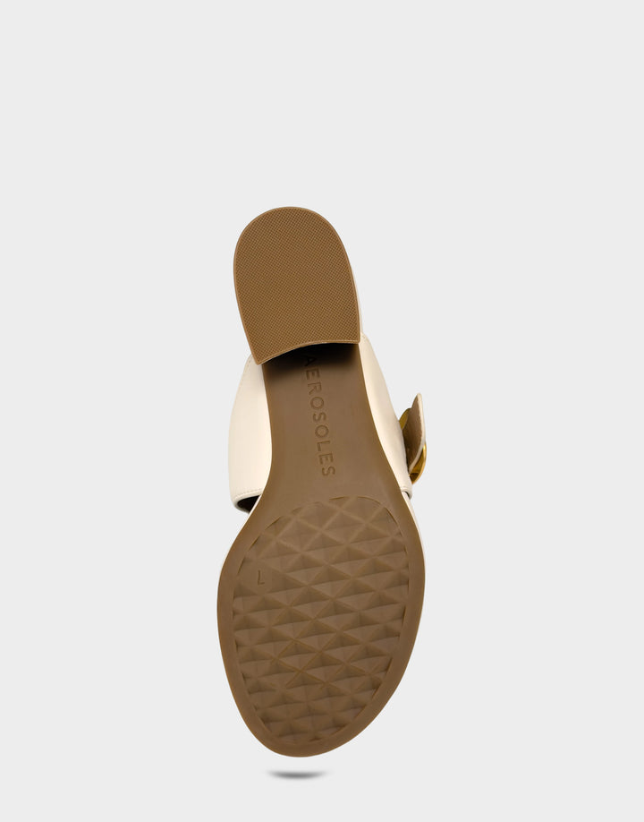 Comfortable Women's Heeled Sandal in Cream Faux Leather Bottom View