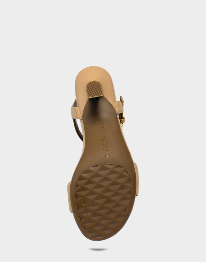 Comfortable Women's Heeled Sandal in Natural Faux Leather Bottom View
