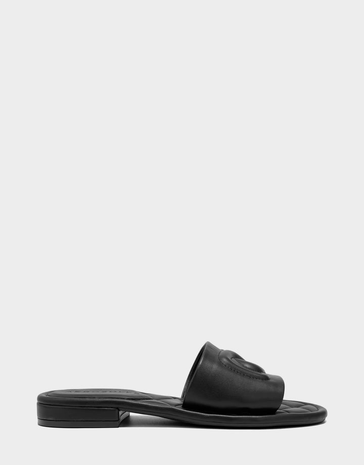 Comfortable Women's Flat Sandal in Black Faux Soft Leather, side view 