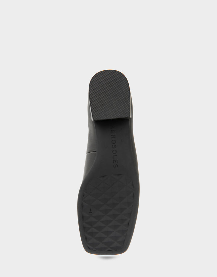 Comfortable Women's Nannie Square Toe Flat In Black Leather, sole view