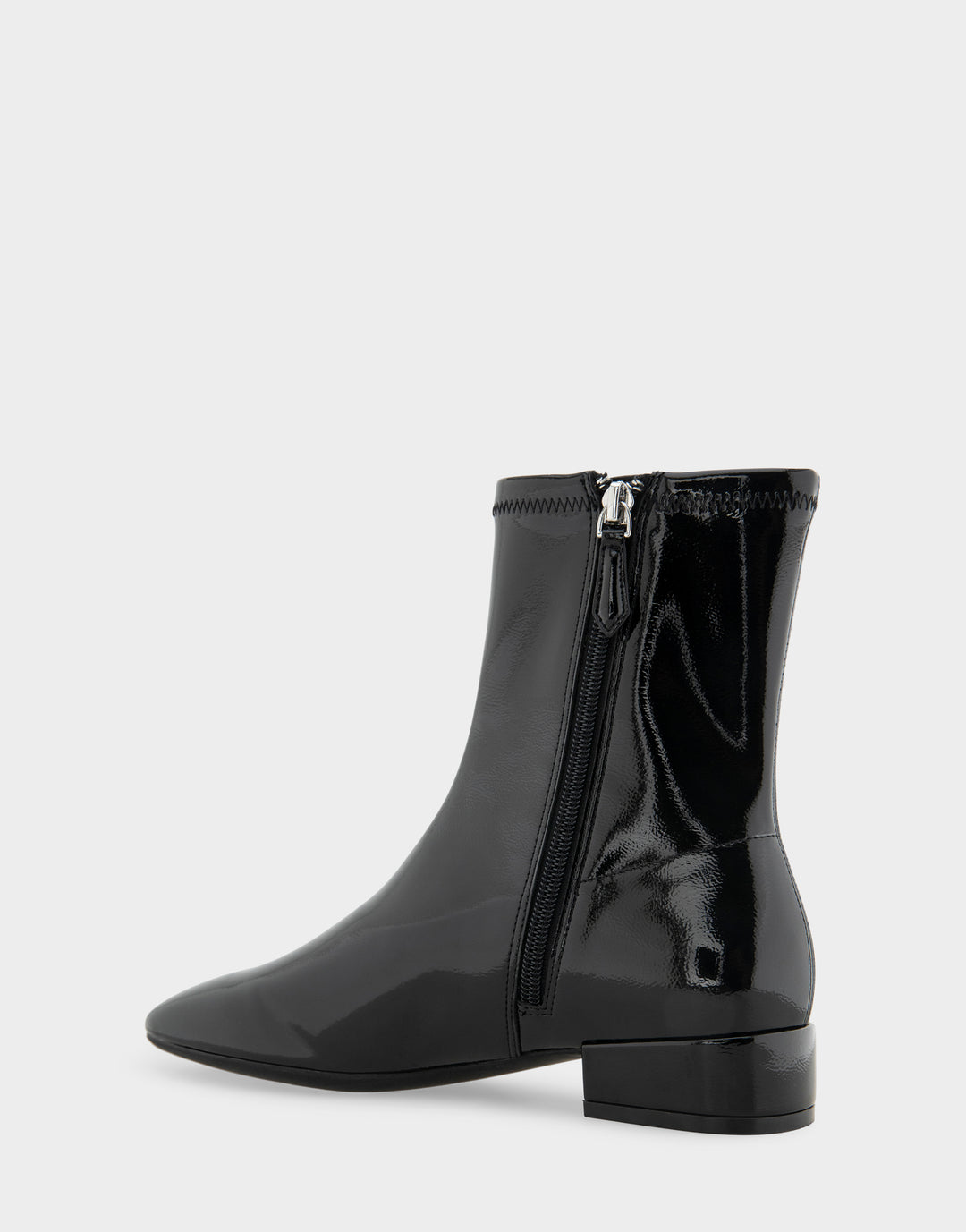 Comfortable Women's Nina Low Block Heel Bootie In Black Patent Faux Leather, back angle view