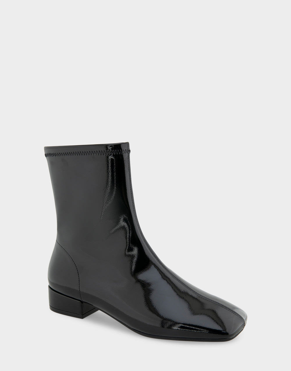 Comfortable Women's Nina Low Block Heel Bootie In Black Patent Faux Leather, angle view