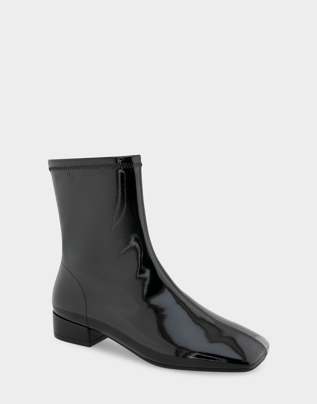 Comfortable Women's Nina Low Block Heel Bootie In Black Patent Faux Leather, angle view