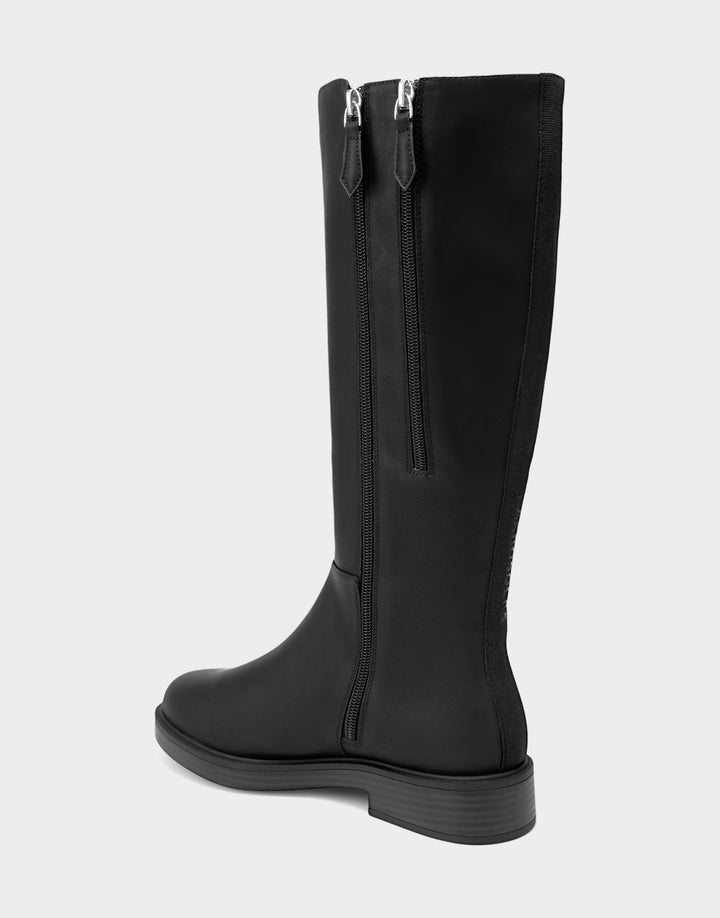 Comfortable Women's Low Block Heel Boot In Black Faux Leather Rear Angle View 
