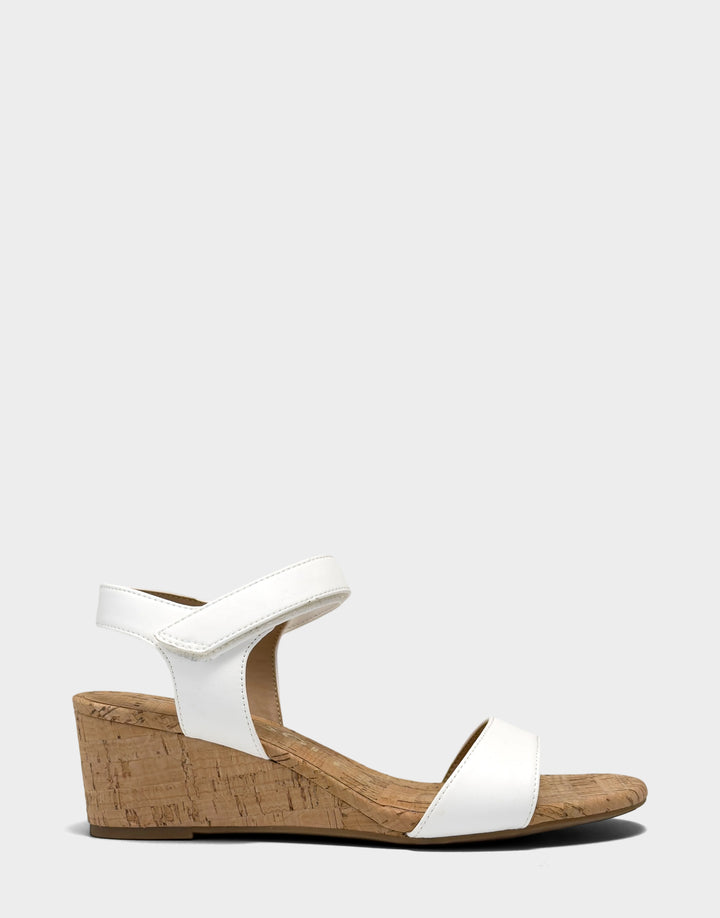 Comfortable Women's Wedge Sandal in White Faux Leather Side View